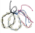 Muschelarmband, 8 Muscheln, am Wachsband, farbich gemischt